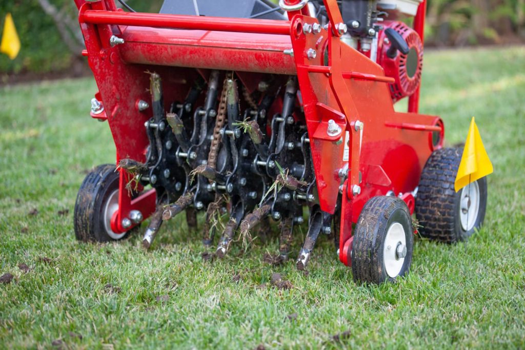 Aerators punching holes in lawn