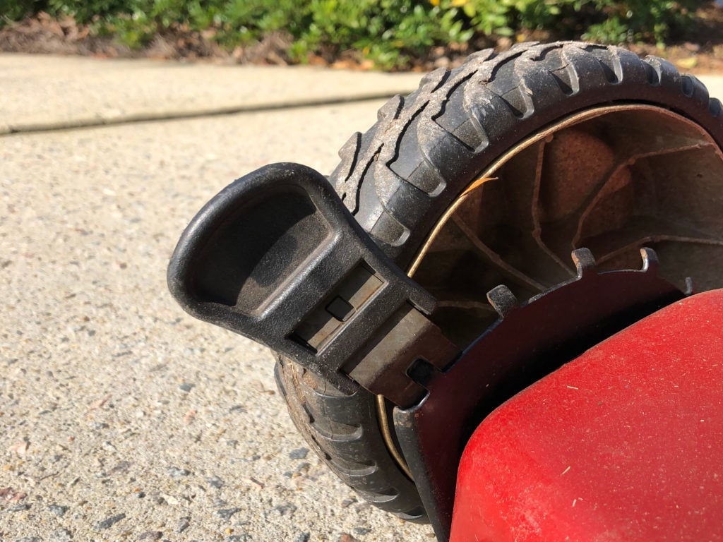 Close Up Of Mower Setting Wheel